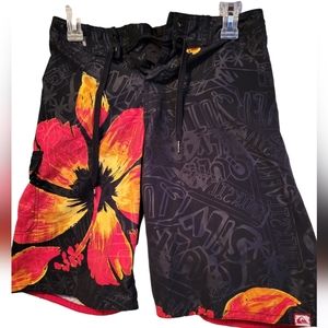 Boys Youth Quicksilver Swimming Shorts Size 16. 28in. Red Floral on Black Logo
